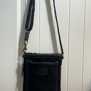 Coach 1941 Leather Crossbody Bag
- Width: 7"
- Should Strap: 22.5"
- Height: 8"